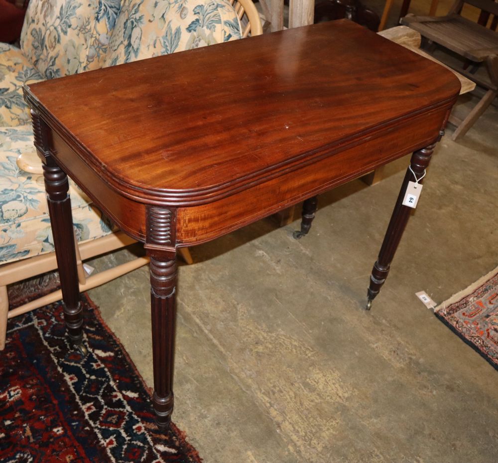 A Regency mahogany folding tea table, W.87cm, D.43cm, H.76cm